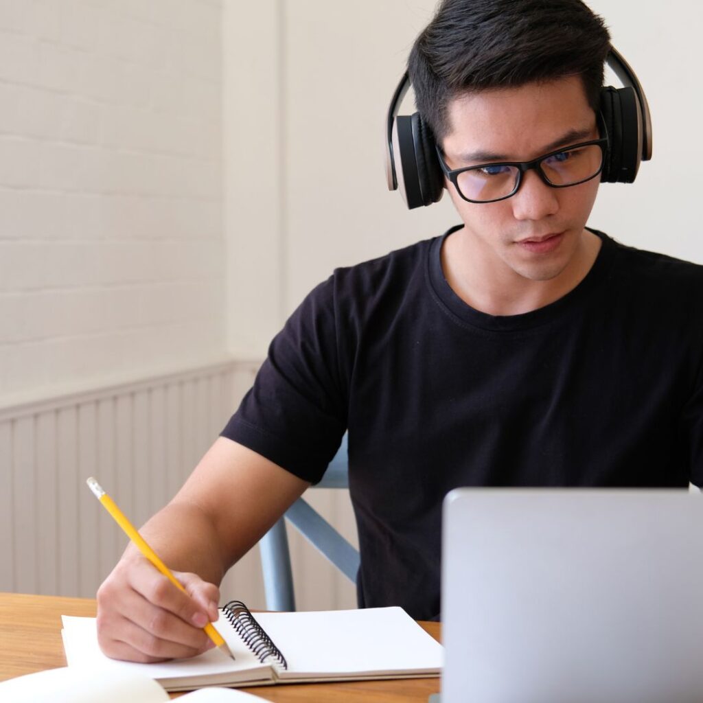 Four Ways EIW Can Help Your Child Improve Their Writing Skills 5 student on laptop writing